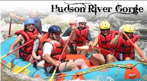 this picture is from www.hudsonriverrafting.com, notice how the guide isn't wearing a helmet