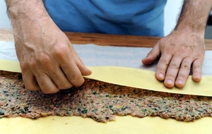 Cutting the dough to fold into pockets (germany.info)