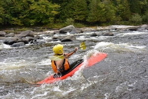 Rachel paddling on Oriskany Creek in a wet suit in September. Photo taken by David Morgan